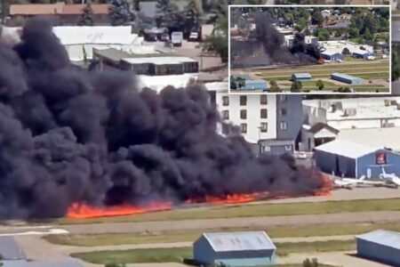 Small plane crashes and hits several parked aircraft, sparking massive fireball