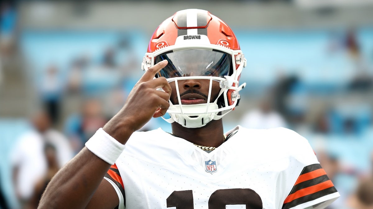 Quarterback Shedeur Sanders #12 of the Cleveland Browns walks out the tunnel prior to the NFL Preseason 2025 game against the Carolina Panthers at Bank of America Stadium on August 08, 2025 in Charlotte, North Carolina.