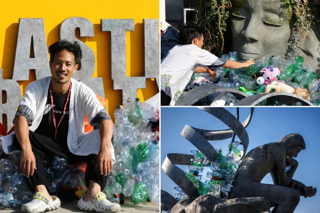 Artist drowns sculpture in plastic waste in front of UN office during pollution talks
