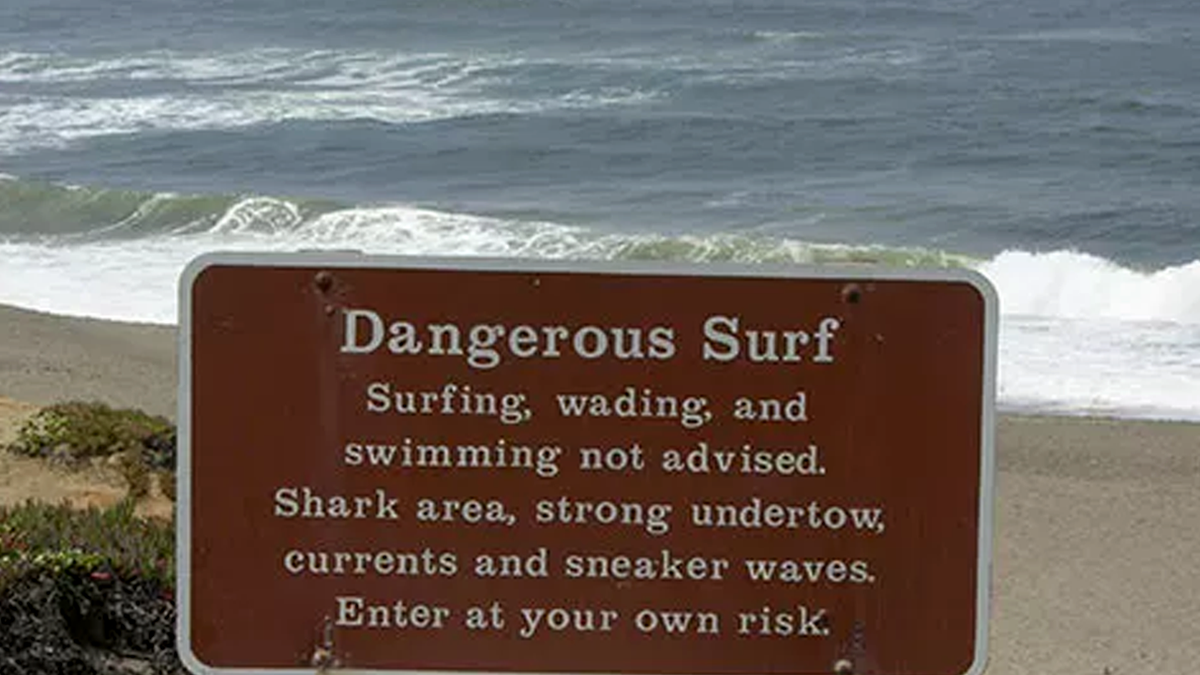 Dangerous surf warning sign