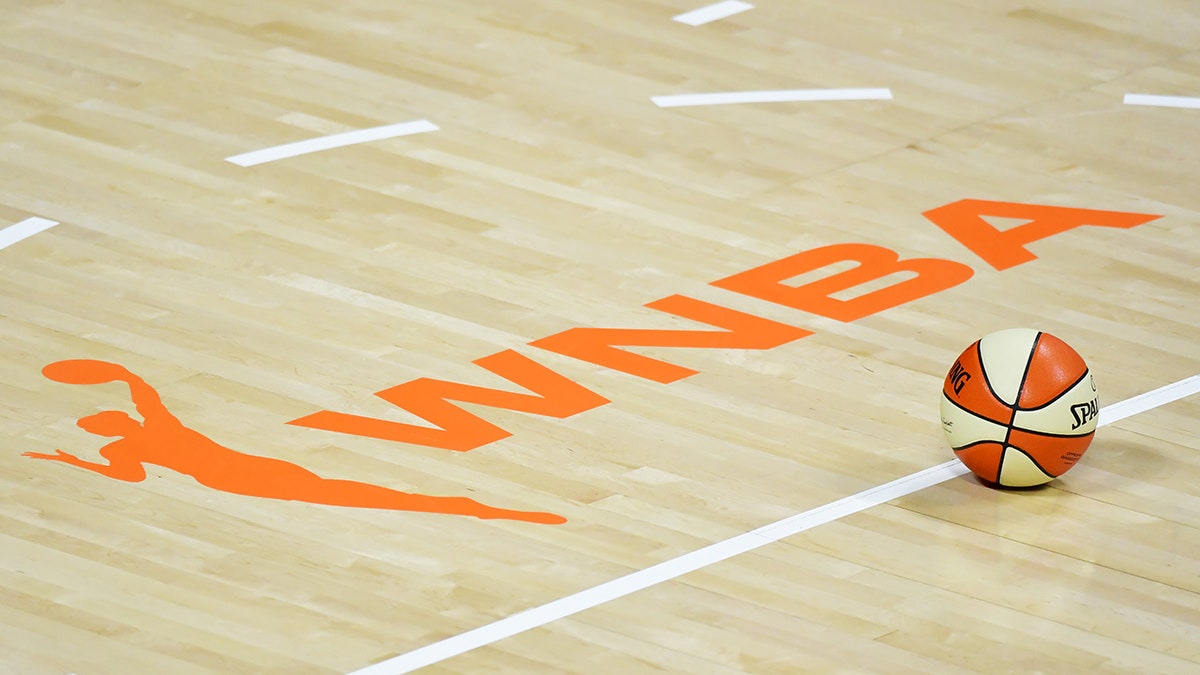 WNBA logo on court
