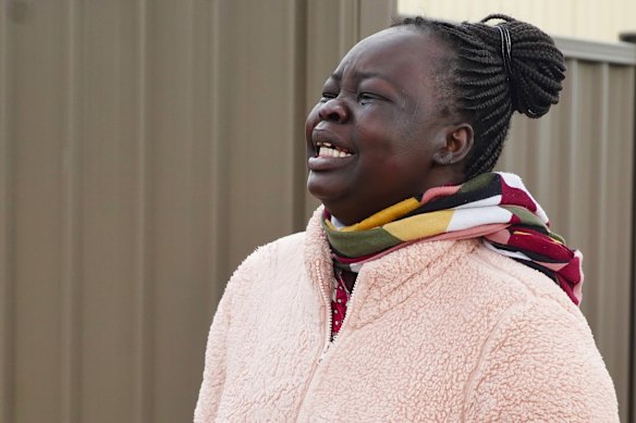 Devastated family friend, Aboil Alor, at the scene of Dau Akueng’s death.