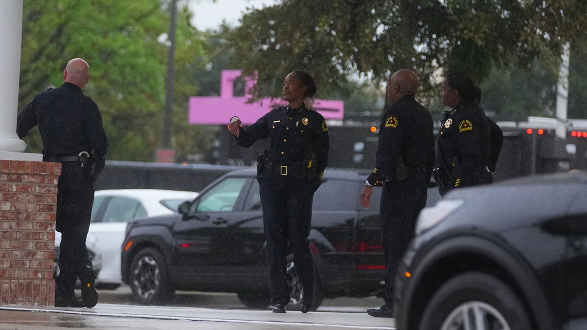Authorities in Dallas after a shooting at an ICE facility