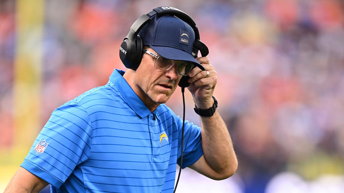 Jim Harbaugh coaches the Chargers