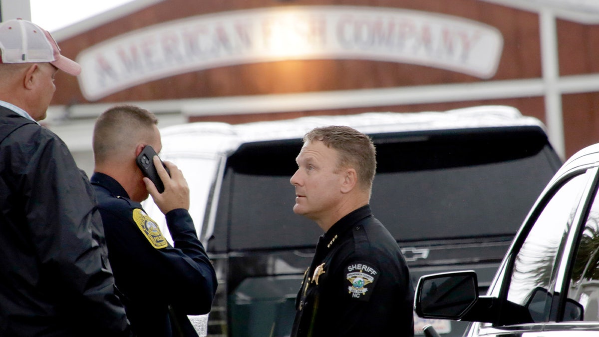 Police officers at scene of shooting