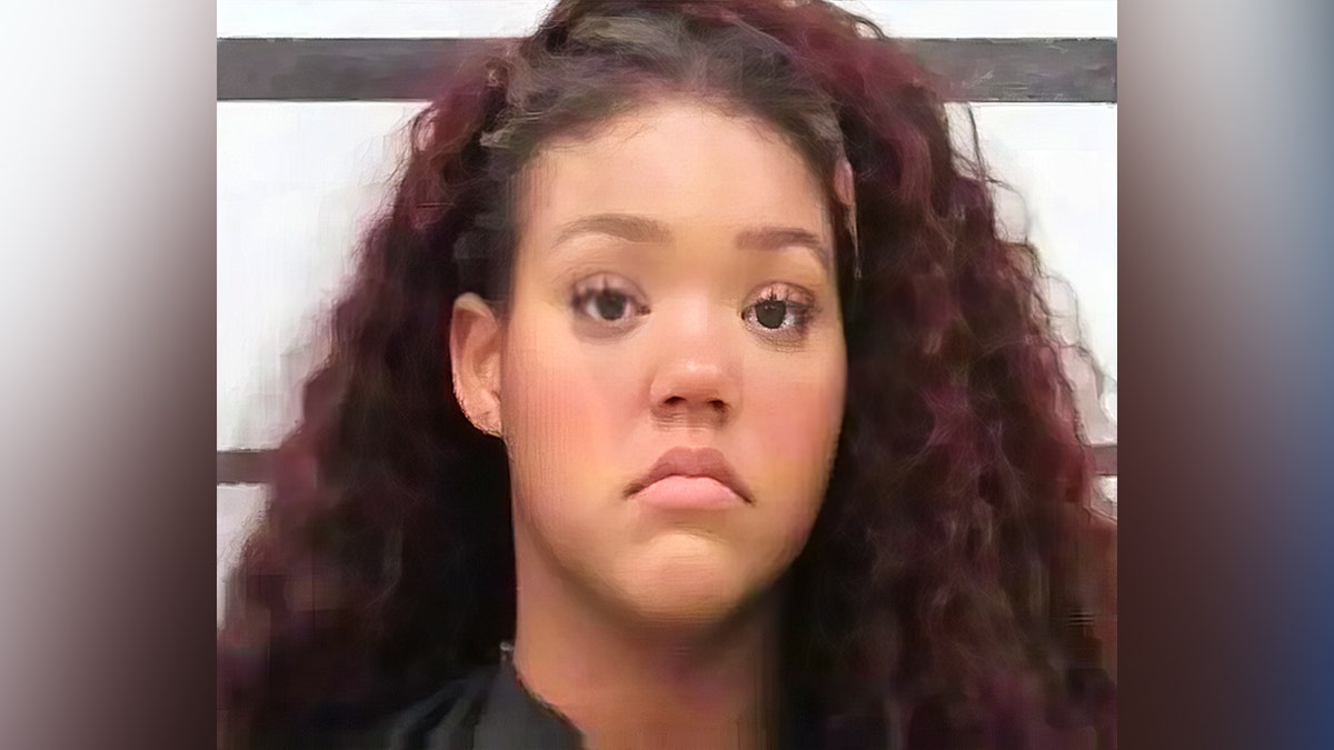 Camryn Giselle Booker, 18, was arrested after she was caught on video mocking a vigil for Turning Point USA founder Charlie Kirk.