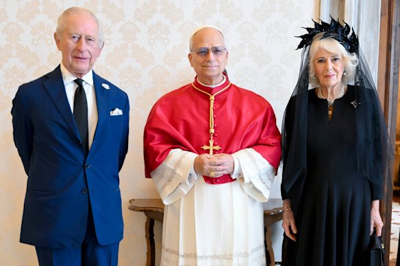 King Charles III and Queen Camilla pose with Pope Leo XIV as they meet at the Vatican during a state visit.