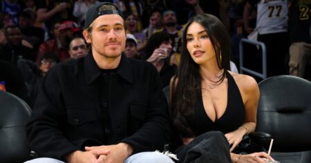 Chargers Quarterback Justin Herbert Saves Girlfriend Madison Beer From Stray Basketball at NBA Game