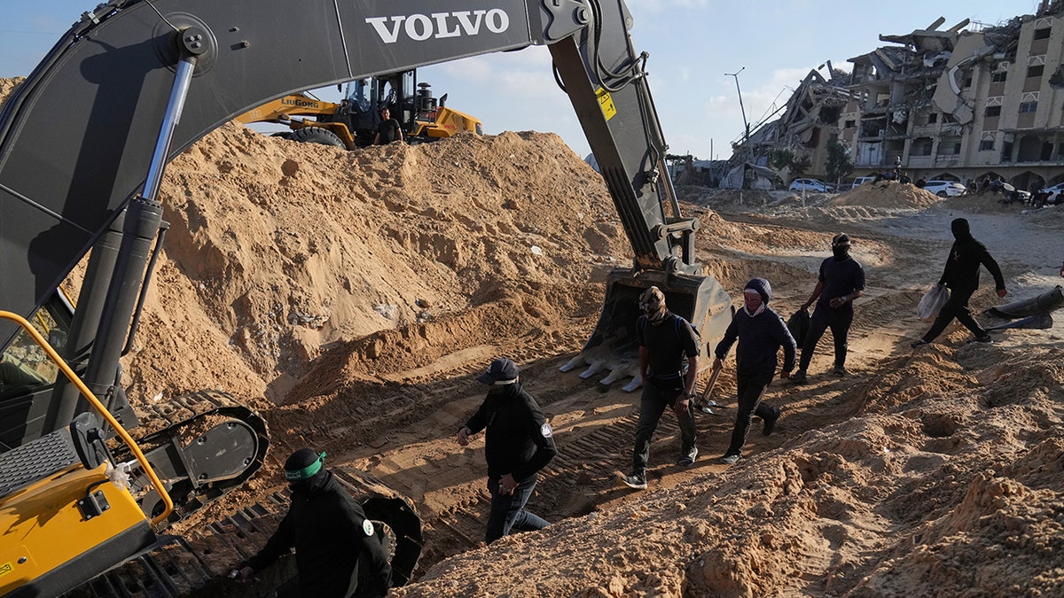 People search for bodies of hostages in Gaza Strip