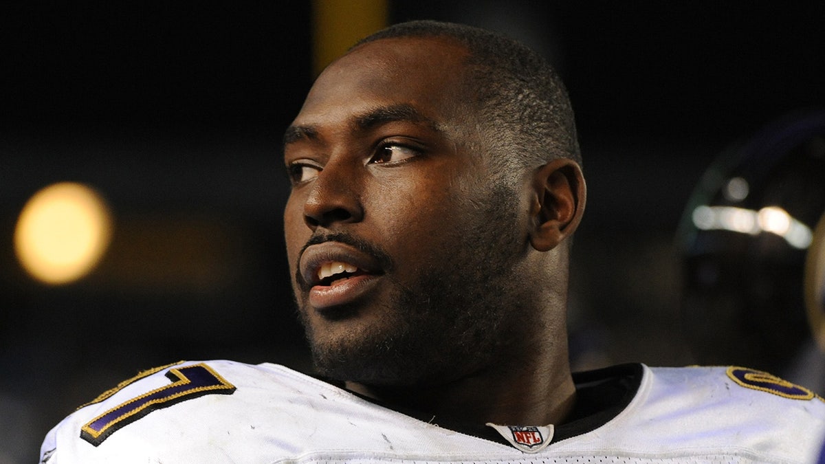 Arthur Jones looks on from the Baltimore Ravens sideline