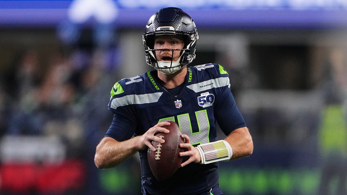 Sam Darnold looks to pass