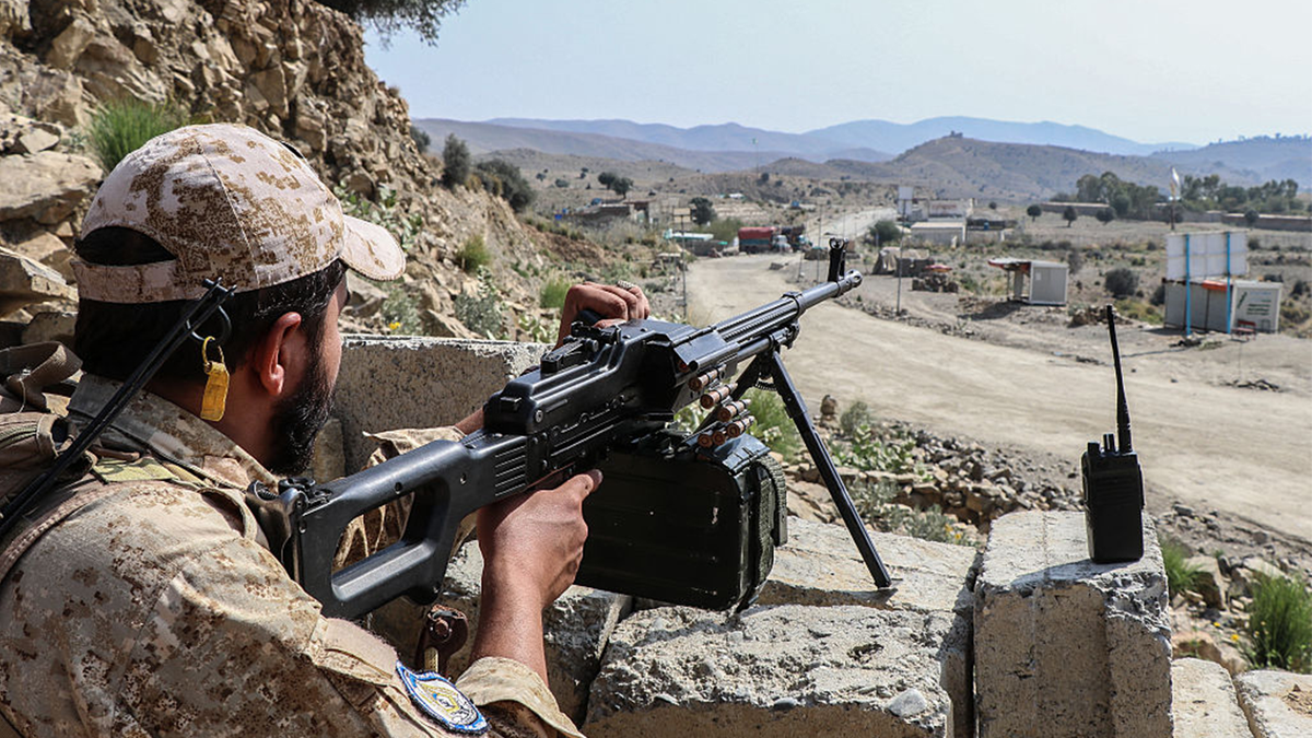 A Taliban security personnel stands guard