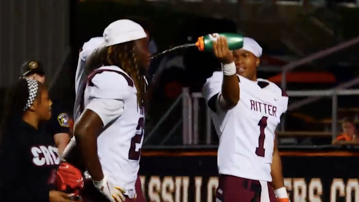 Football players getting water
