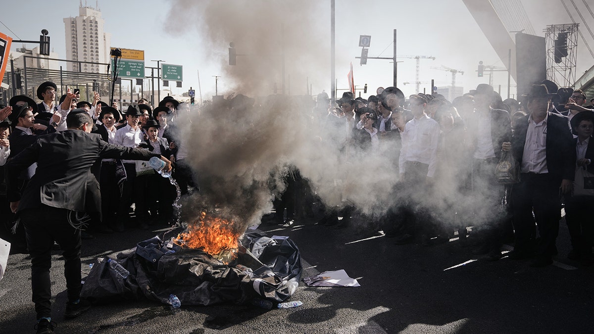 Ultra Orthodox burning shot