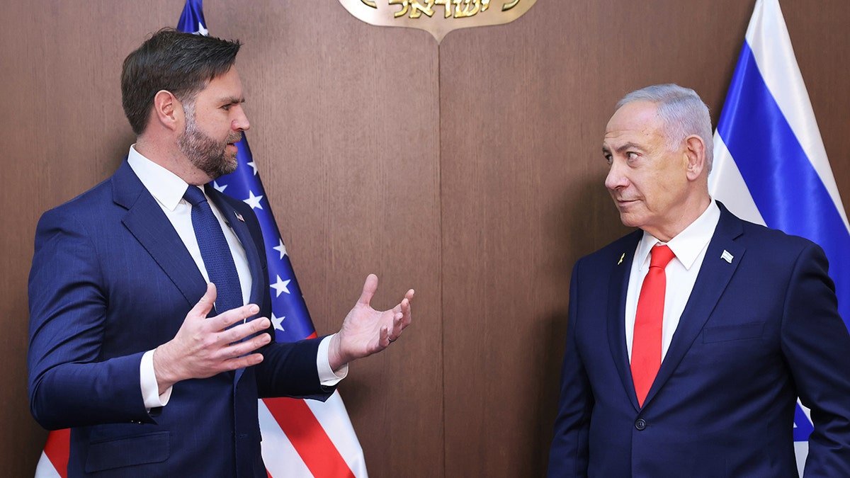 Vice President JD Vance gestures as he talks to Israeli Prime Minister Benjamin Netanyahu
