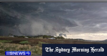 Large hail and lightning hit Queensland as residents brace for severe storms