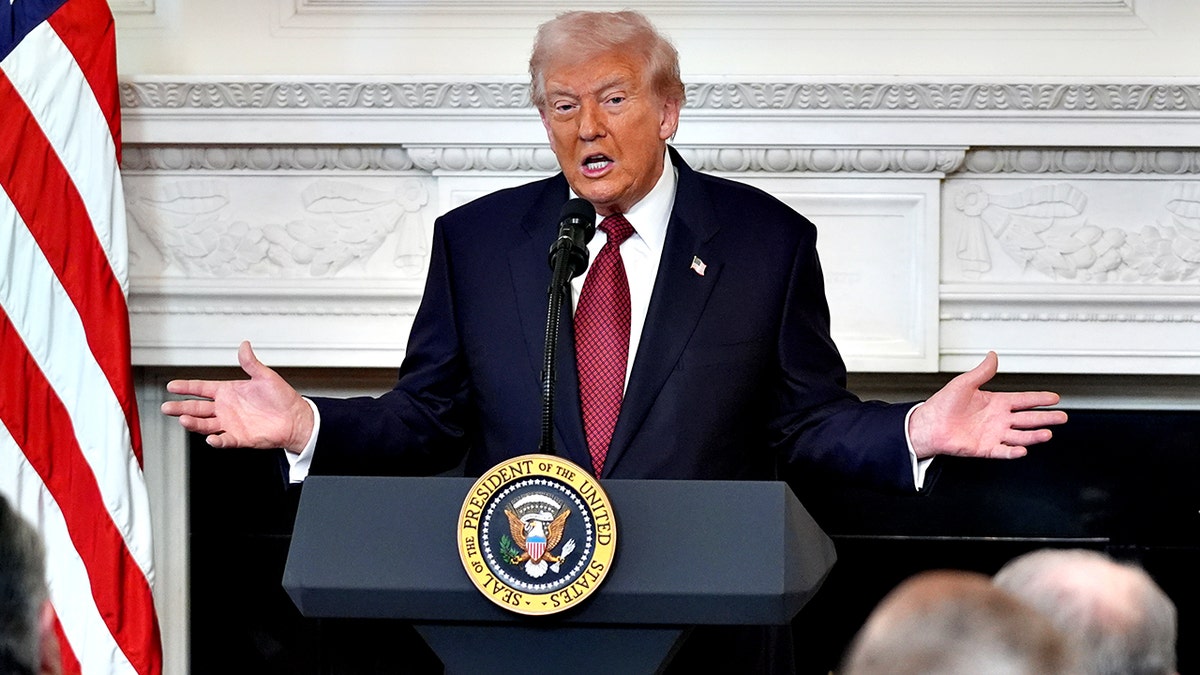 President Donald Trump gestures while speaking