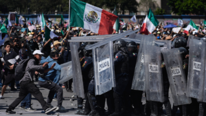 Protesters attack police, breach barrier at Mexico's National Palace during rally against cartel violence