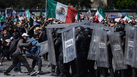 Protesters attack police, breach barrier at Mexico's National Palace during rally against cartel violence