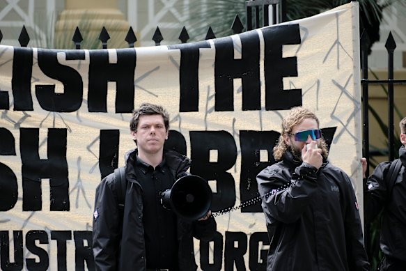 Joel Davis, right, at the NSN event outside parliament. 