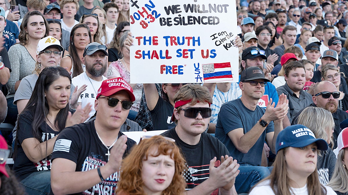 Charlie Kirk supporters gather together in mourning.