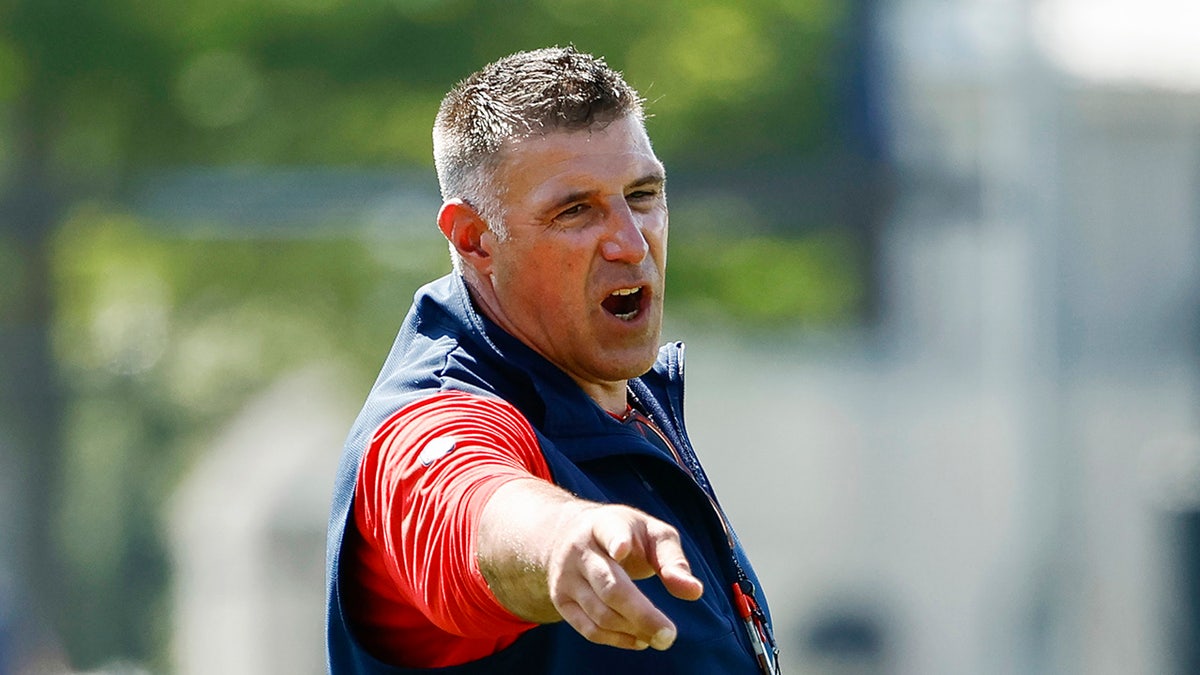Mike Vrabel coaches the New England Patriots
