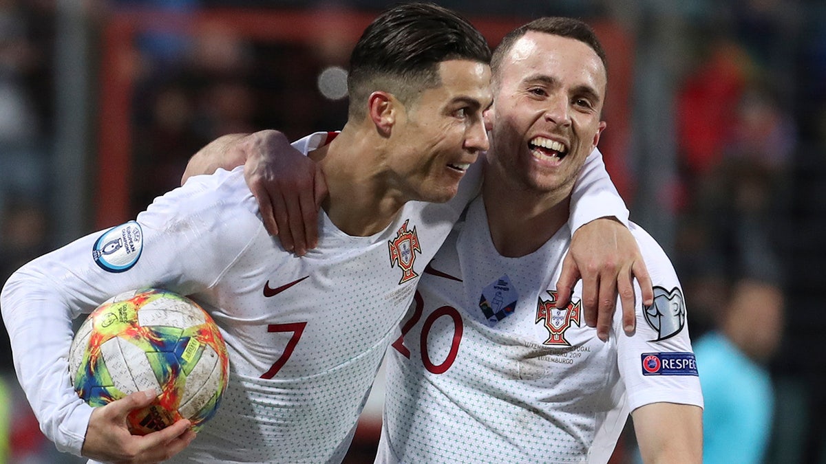 Cristiano Ronaldo and Diogo Jota