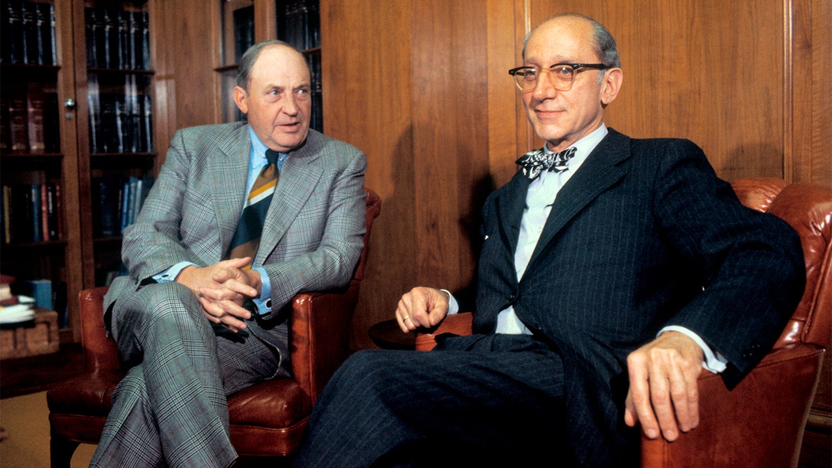 Attorney General-designate Edward Levi meets with outgoing Attorney General William Saxbe at the Justice Department.