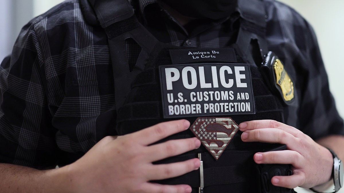 Close up of ICE agent logo