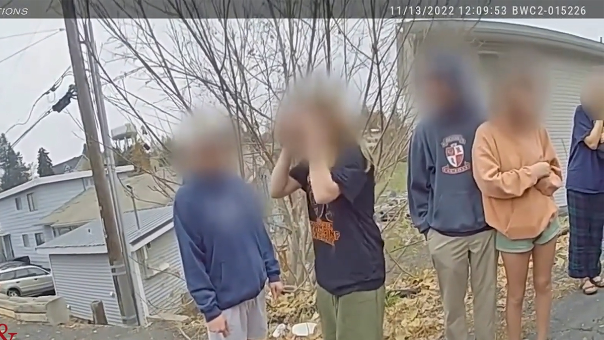 Witnesses gathered in the street across from 1122 King Road on the morning of the Idaho student murders