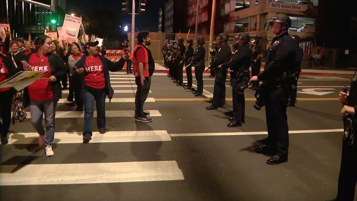 Protesters face off with law enforcement near LAX