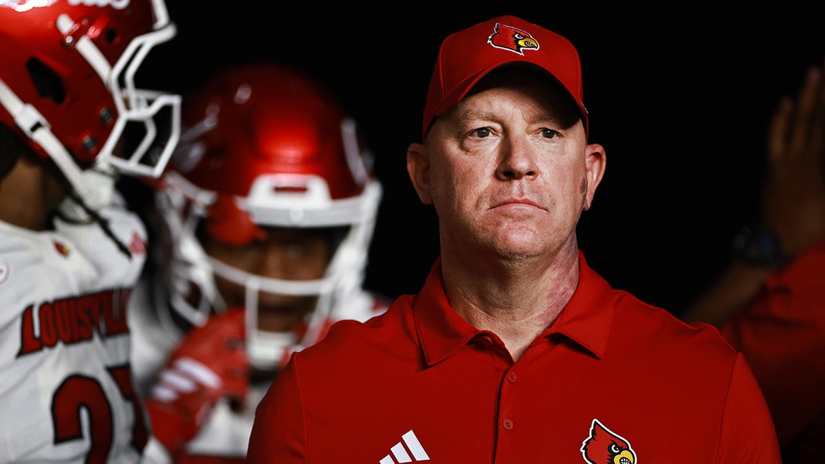 Jeff Brohm looks before a game