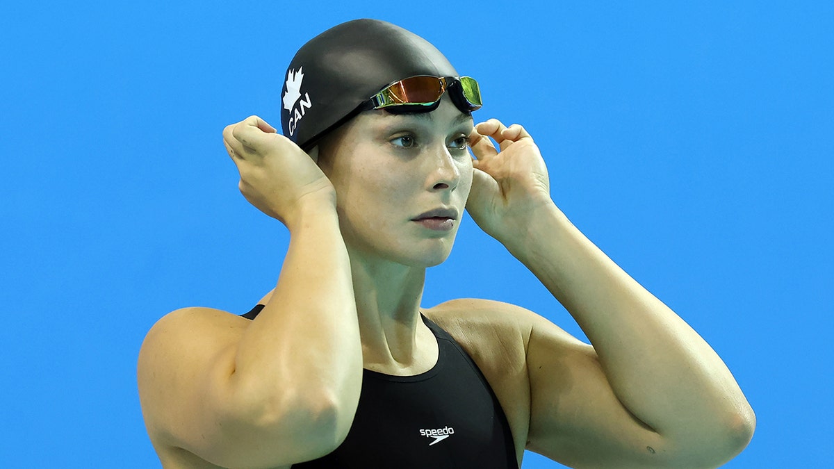 Penny Oleksiak prepares for swim