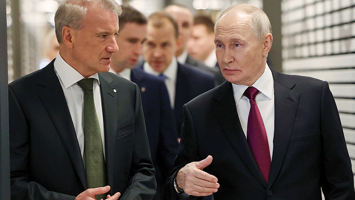 Vladimir Putin speaking to German Gref.