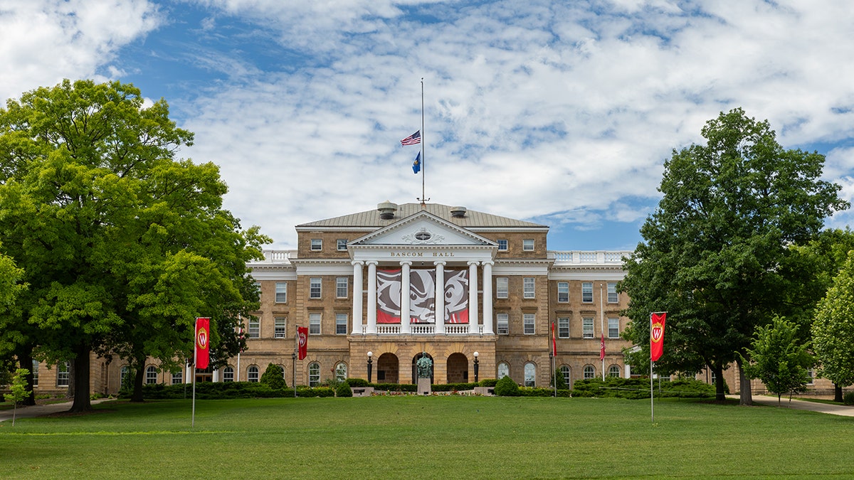 Building on the university of Wisconsin campus with green lawn in foreground