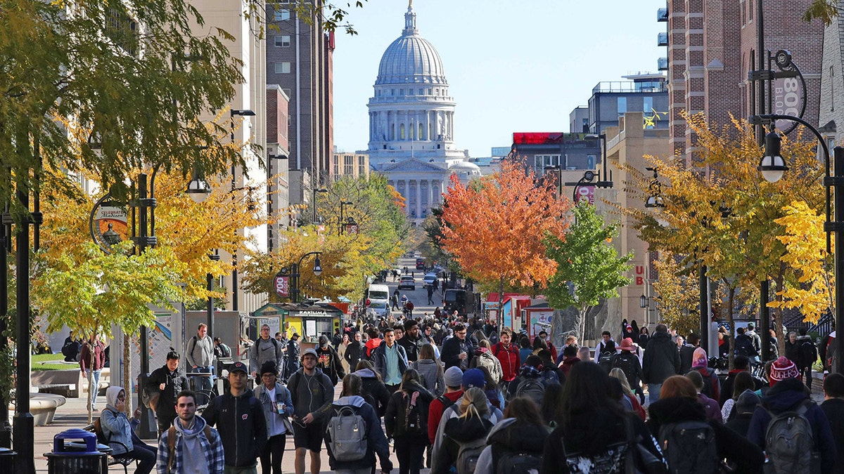 Crowd of students on University of Wisconsin campus on a fall day