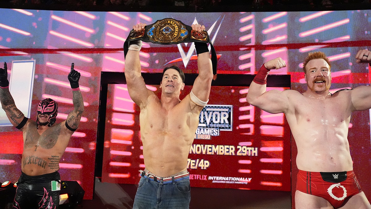 John Cena with Rey Mysterio and Sheamus