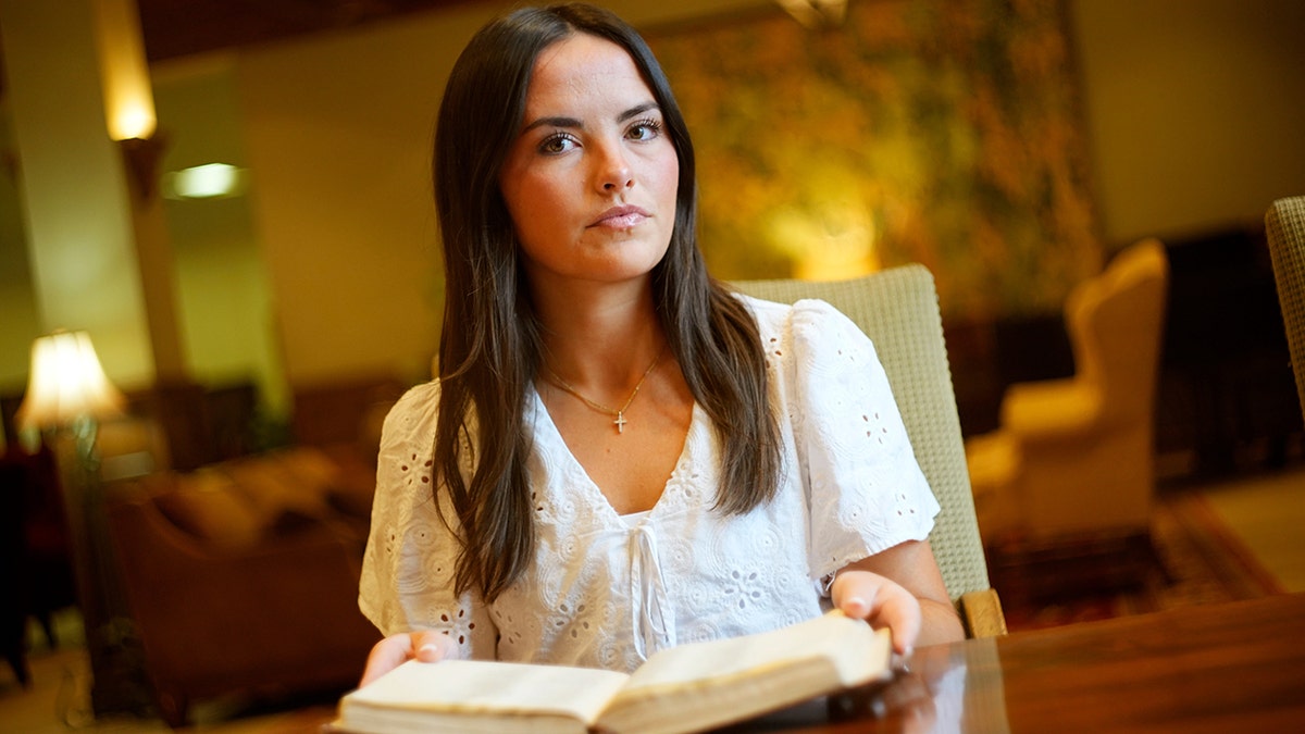 Samantha Fulnecky graded zero by TA holding a bible