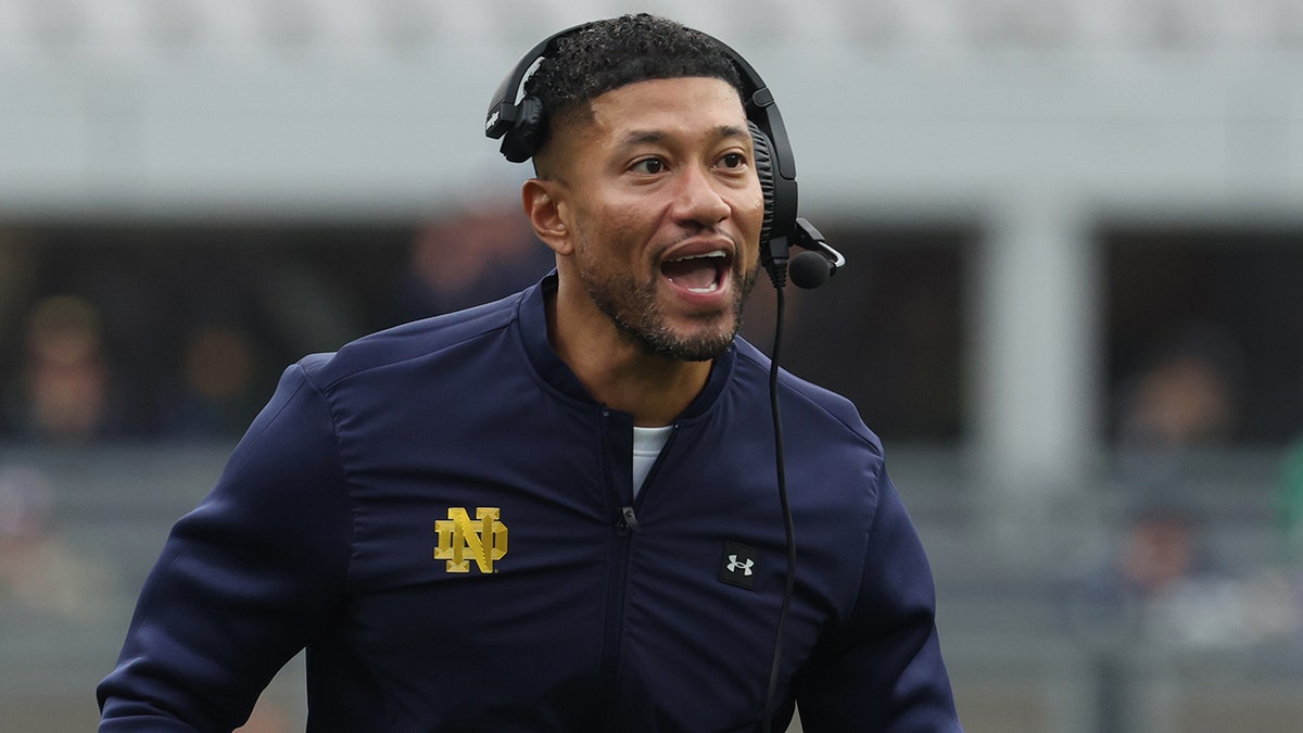 Marcus Freeman calls plays on the sideline