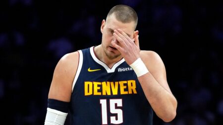 Nuggets star Nikola Jokic suffers knee injury, misses entire second half in loss to Miami Heat