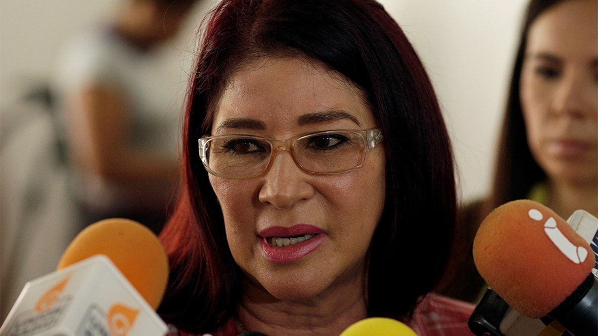 Cilia Flores, wife of Venezuela's President Nicolas Maduro, talks to the media during a simulation of the government's official July 30 vote for a new assembly, in Caracas, Venezuela July 16, 2017. Â Marco Bello/ Reuters