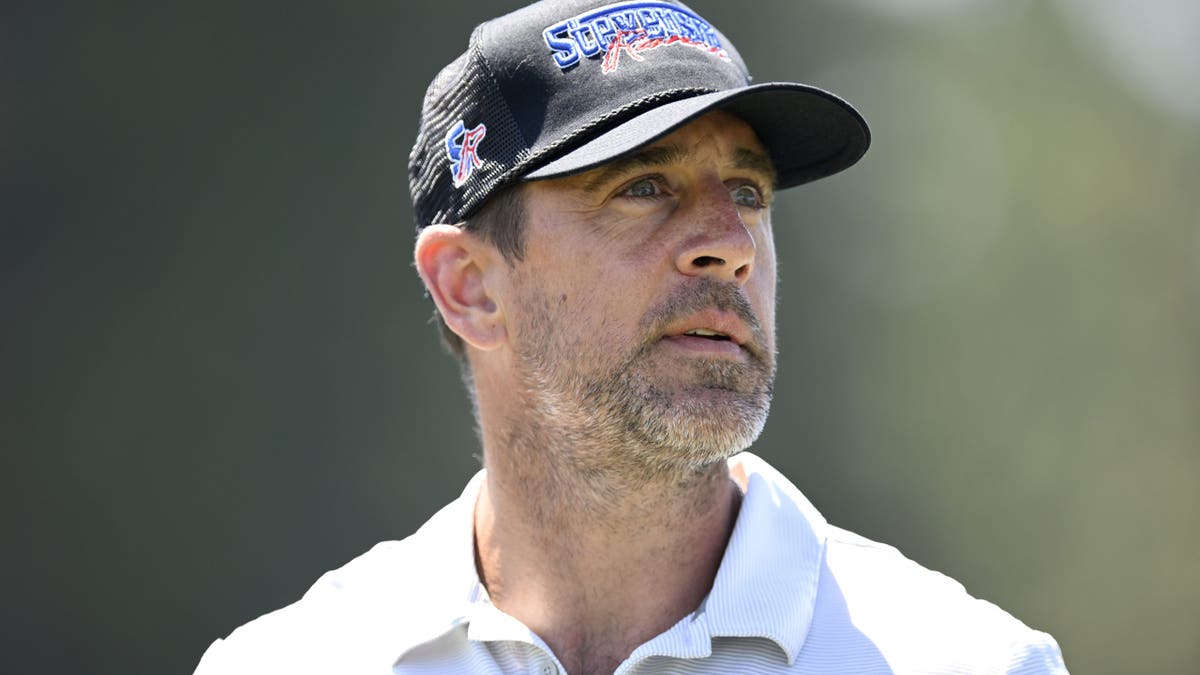 Aaron Rodgers during a golf event