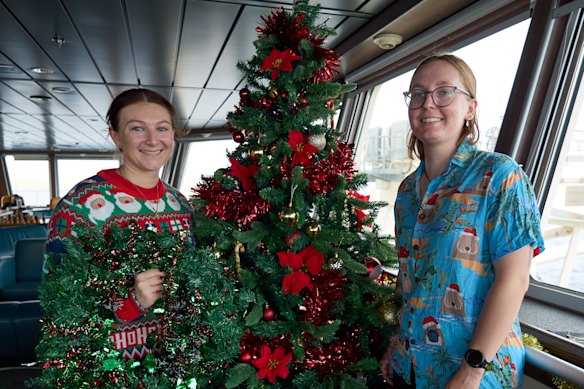 The boat’s social co-ordinators, Madi Farrant and Frances Perry, are preparing for Christmas Day.