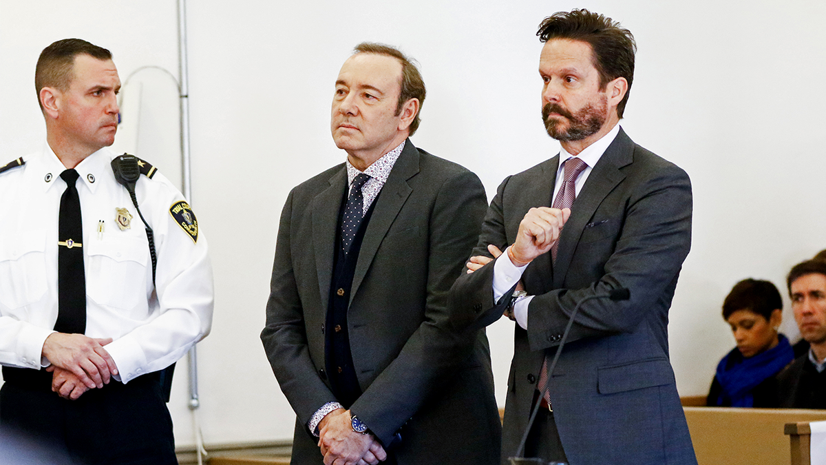 Alan Jackson and Kevin Spacey in court