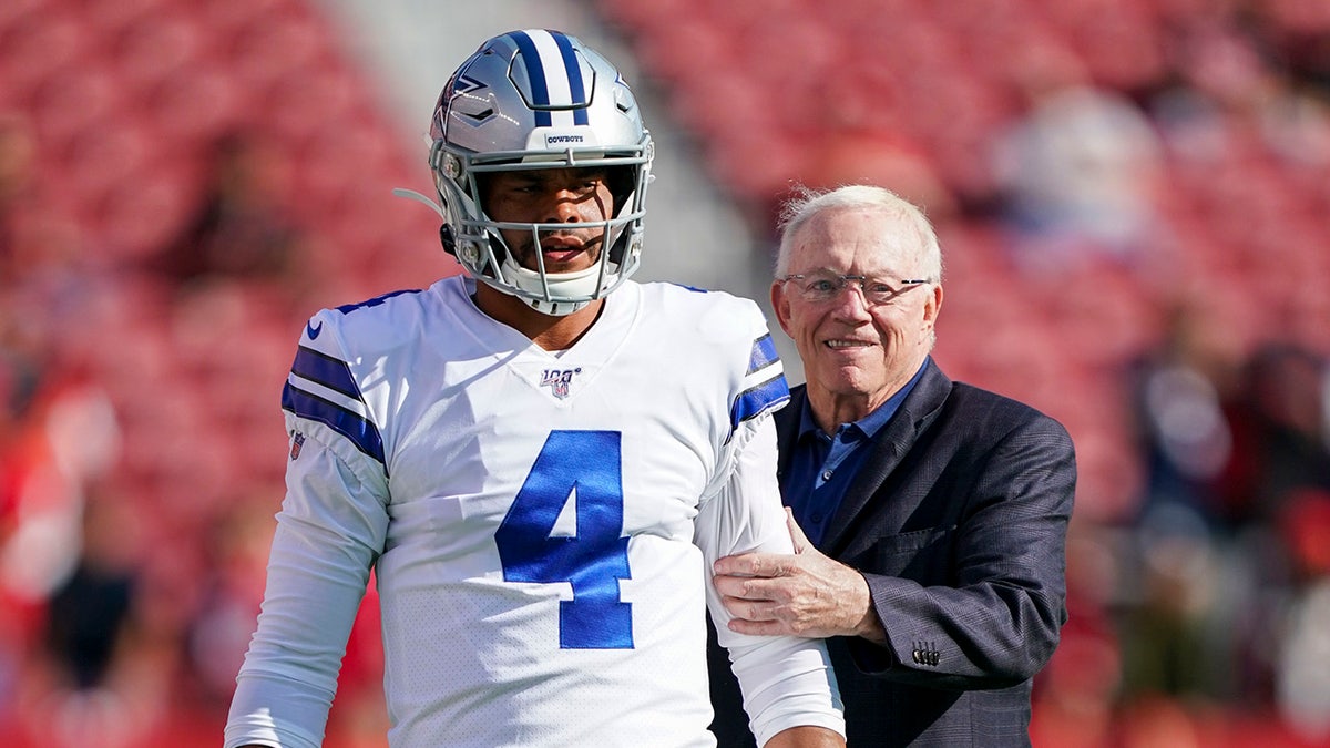 Dak Prescott and Jerry Jones before a game