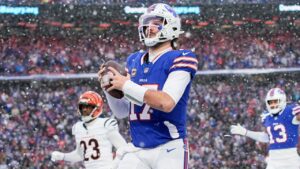 Bills rally with 21 points in 4th quarter to defeat Bengals in snowy Buffalo