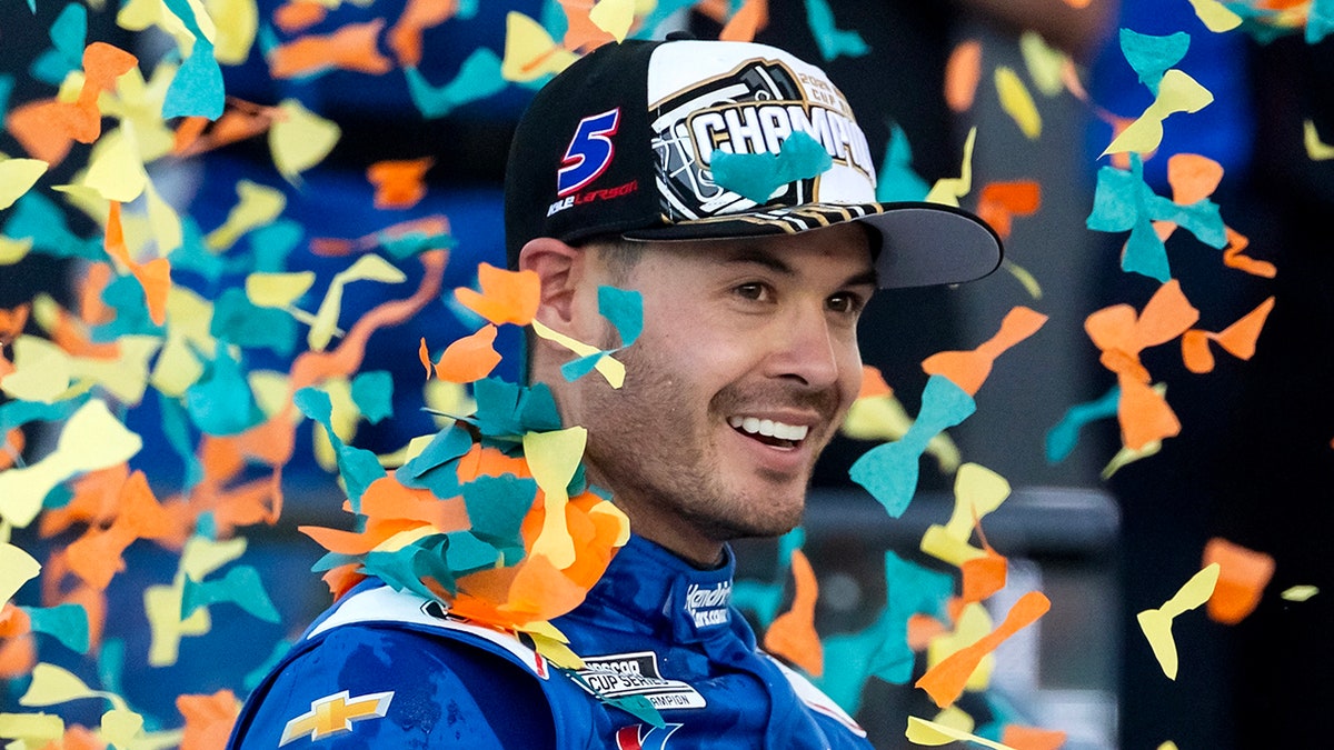 Kyle Larson looks on