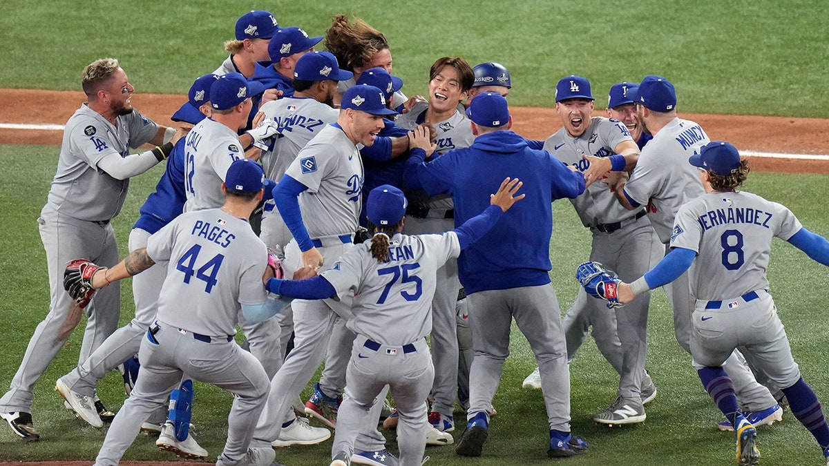 Dodgers celebrate on the field