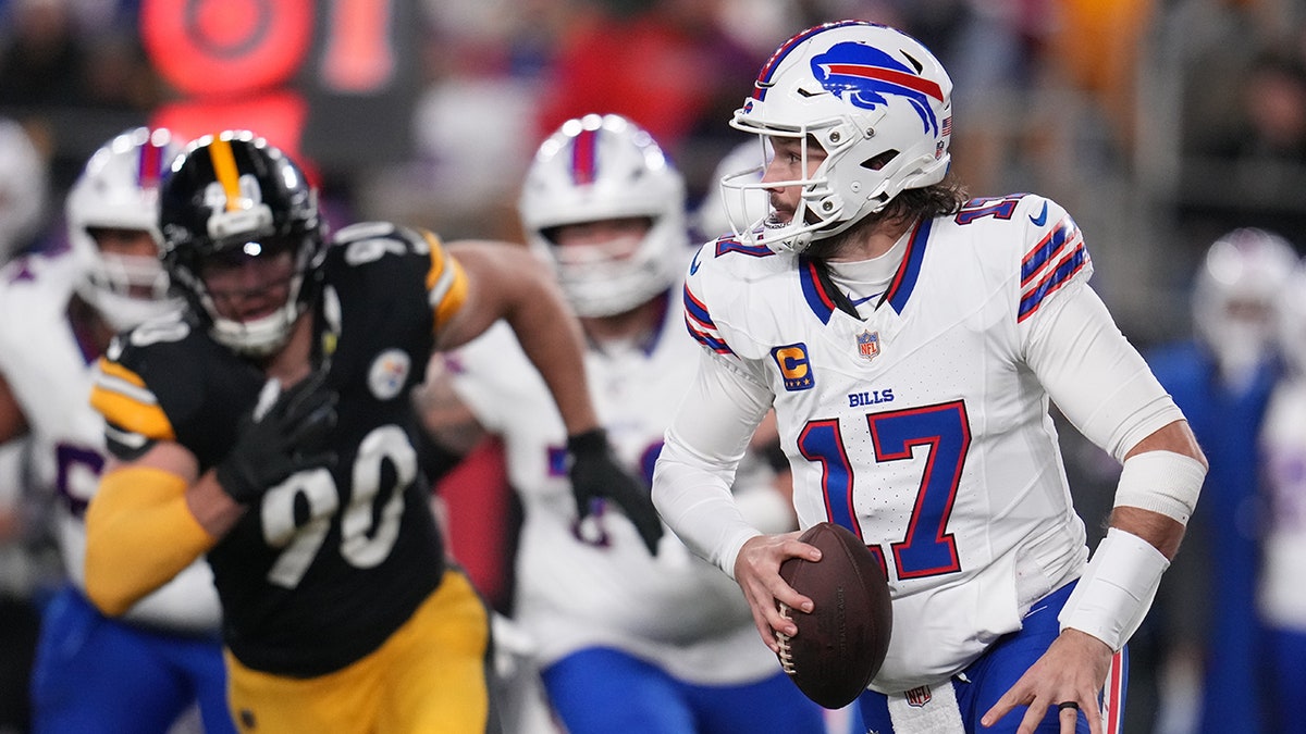 Josh Allen looks to pass