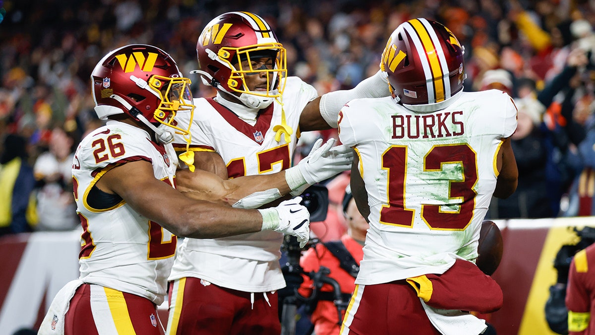 Treylon Burks celebrates